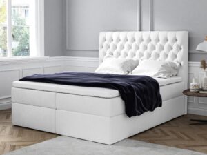 Miniaturka 1 - Łóżko kontynentalne białe glamour z pikowanym zagłówkiem chesterfield w aranżacji