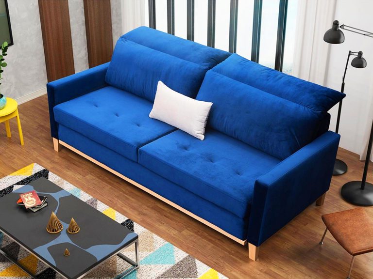 Granatowa tapicerowana sofa na nóżkach
