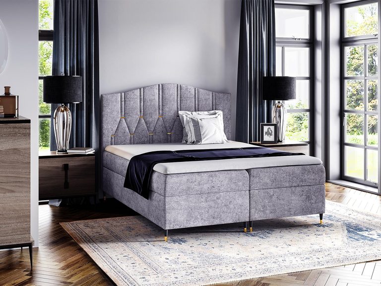 Łóżko kontynentalne z eleganckim obiciem