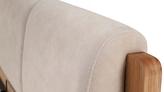 Miniaturka 9 - Zbliżenie na beżowy zagłówek z pikowanym wykończeniem