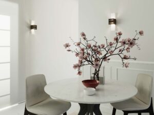 Miniaturka 14 - Jadalnia z dwoma czarnymi kinkietami i kwiatami magnolii