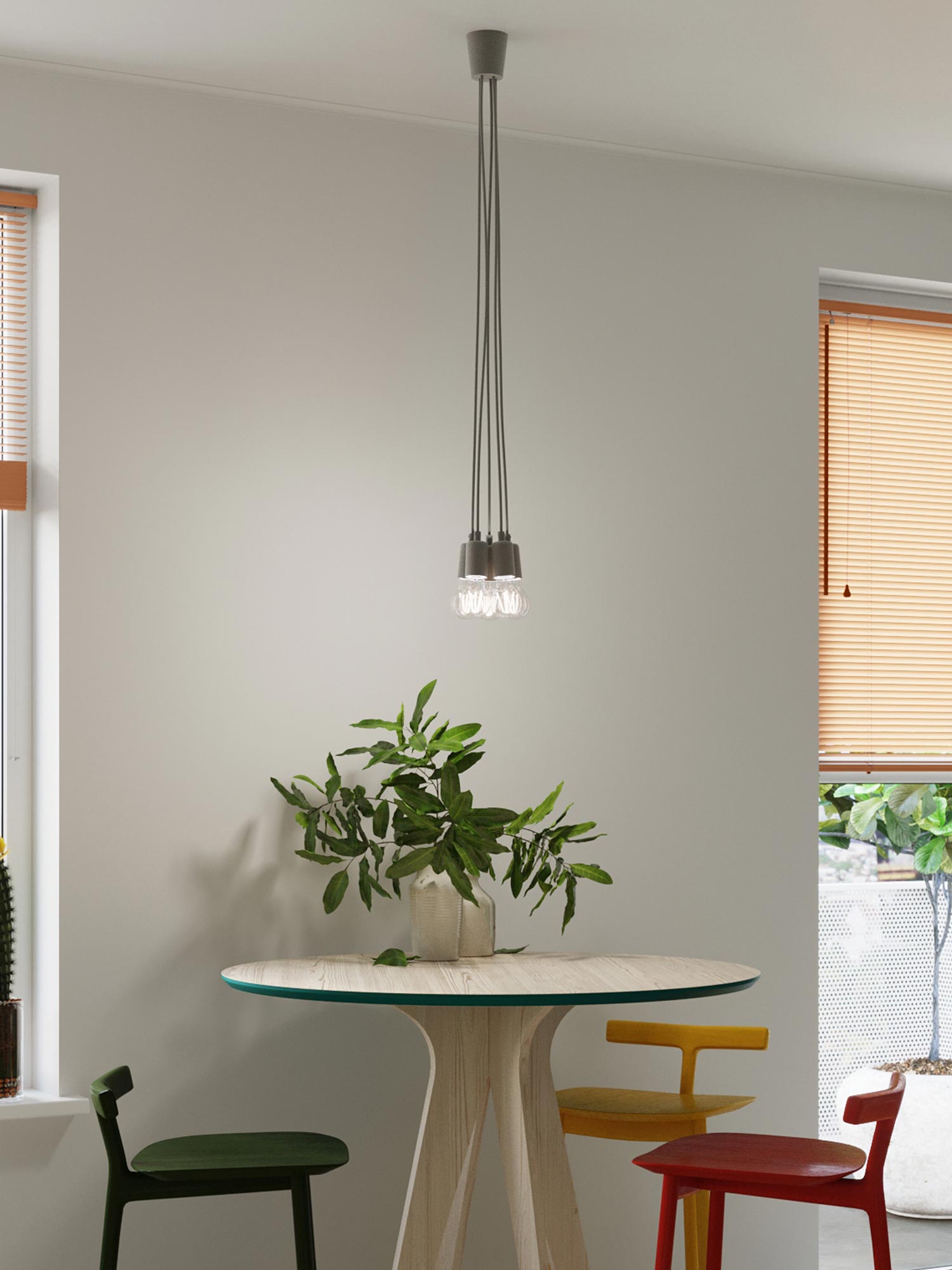 Designerska lampa wisząca z szarymi kloszami nad stołem w jadalni Designerska lampa wisząca z szarymi kloszami nad stołem w jadalni