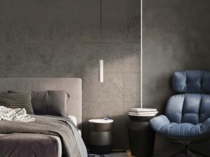 Miniaturka 5 - Widok z góry na łóżko z betonową lampą zawieszoną centralnie