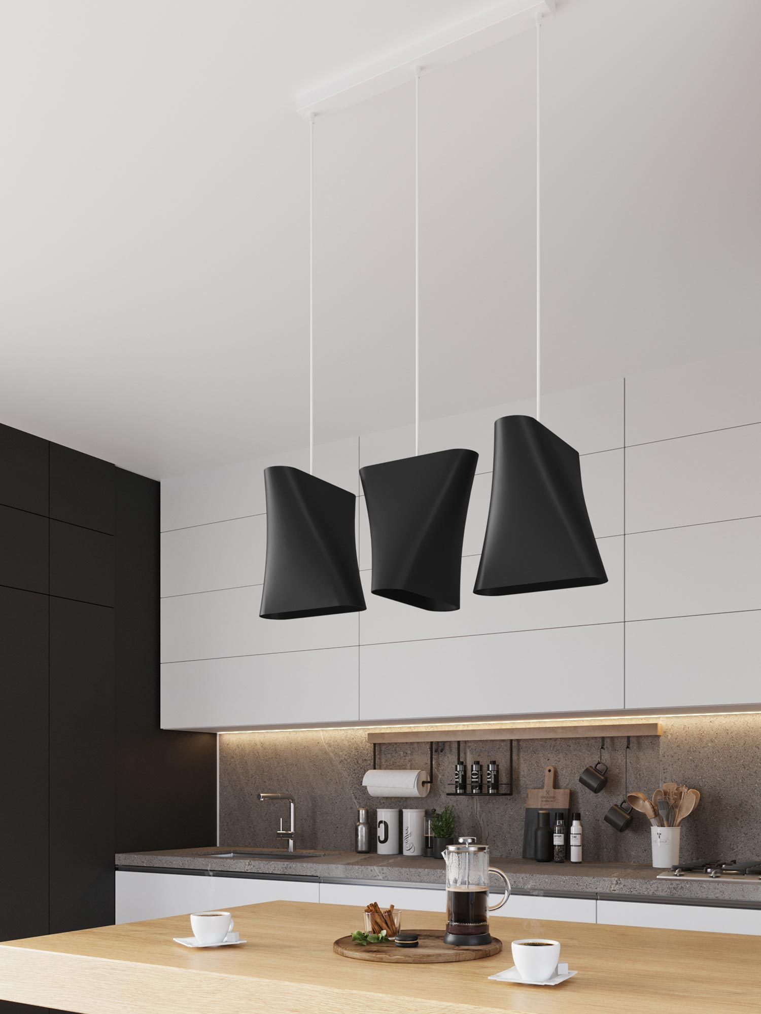 Czarna potrójna lampa LED wisząca w kuchni z białą zabudową