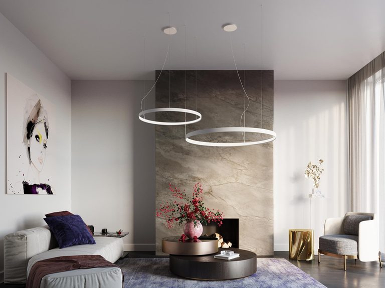 Kruhová LED lampa nad moderním obývacím pokojem