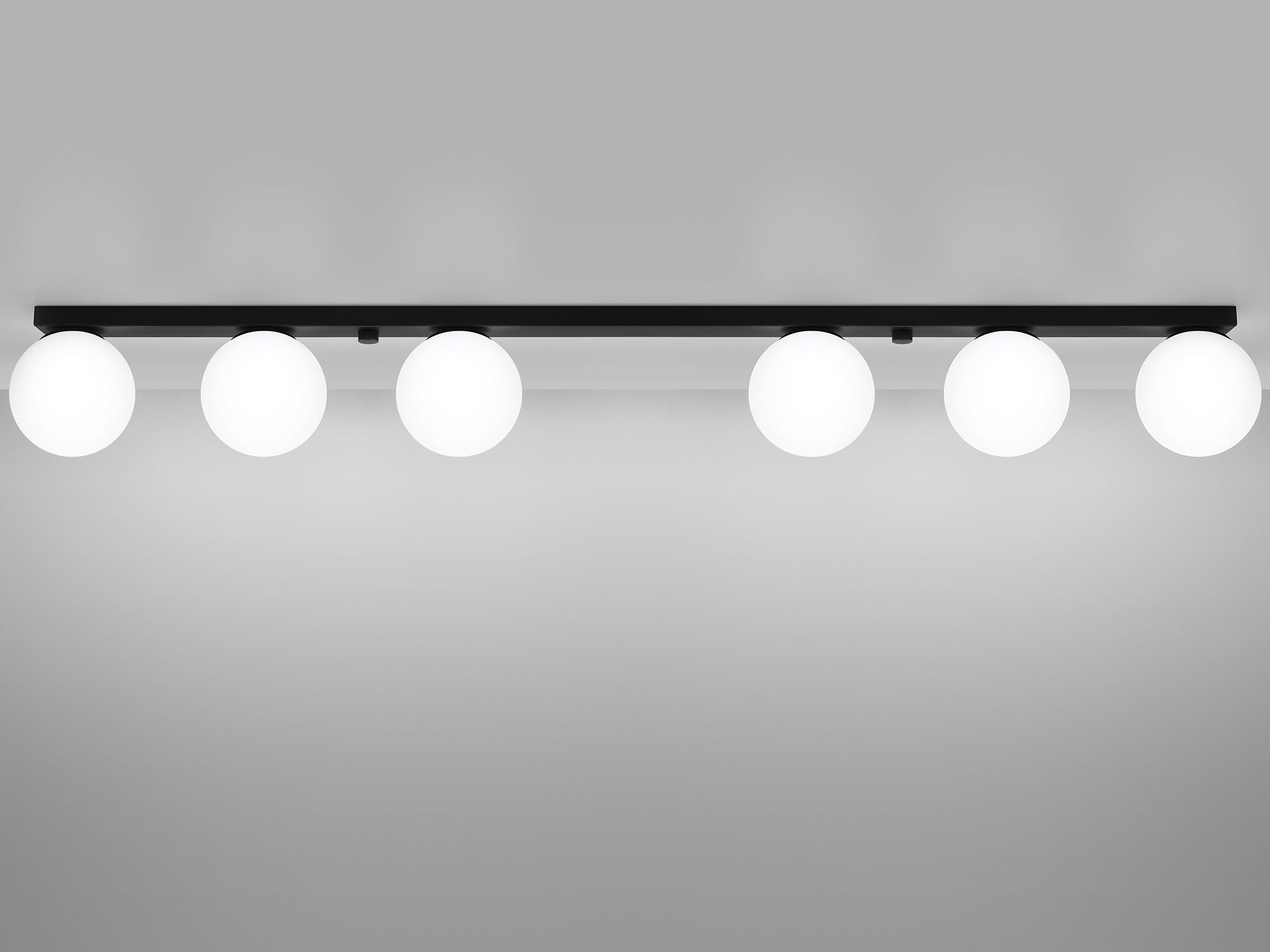 Lampa sufitowa z pięcioma kulami LED na czarnej listwie Lampa sufitowa z pięcioma kulami LED na czarnej listwie