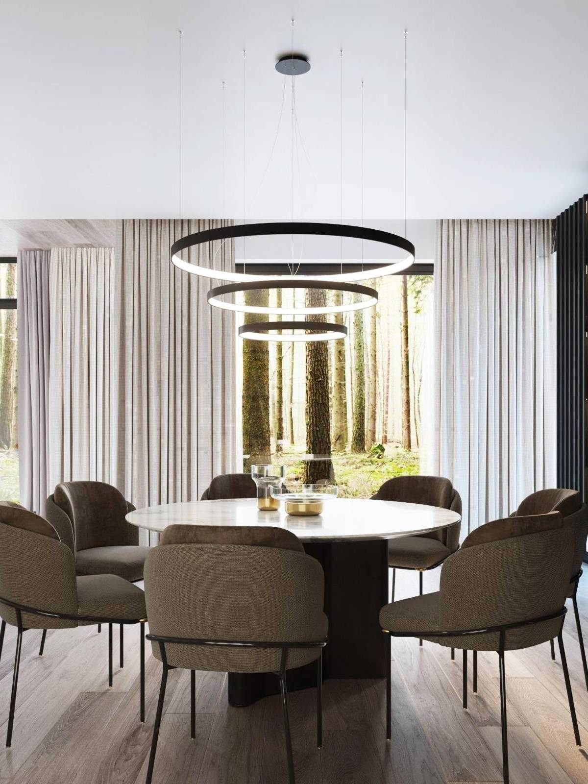 Nowoczesna jadalnia z dużym okrągłym stołem i oświetleniem LED