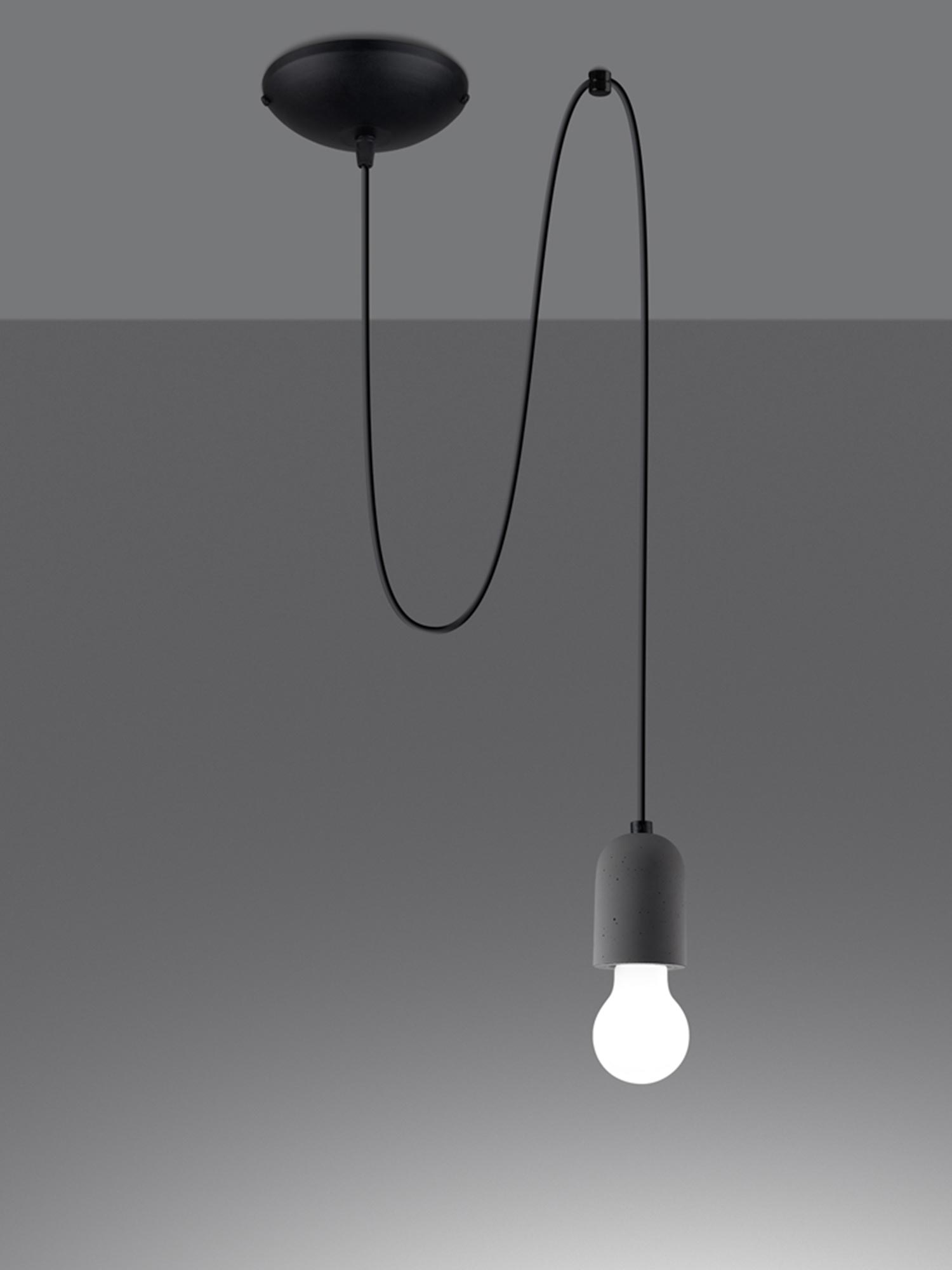 Nowoczesna lampa z betonową oprawą na czarnym kablu Nowoczesna lampa z betonową oprawą na czarnym kablu