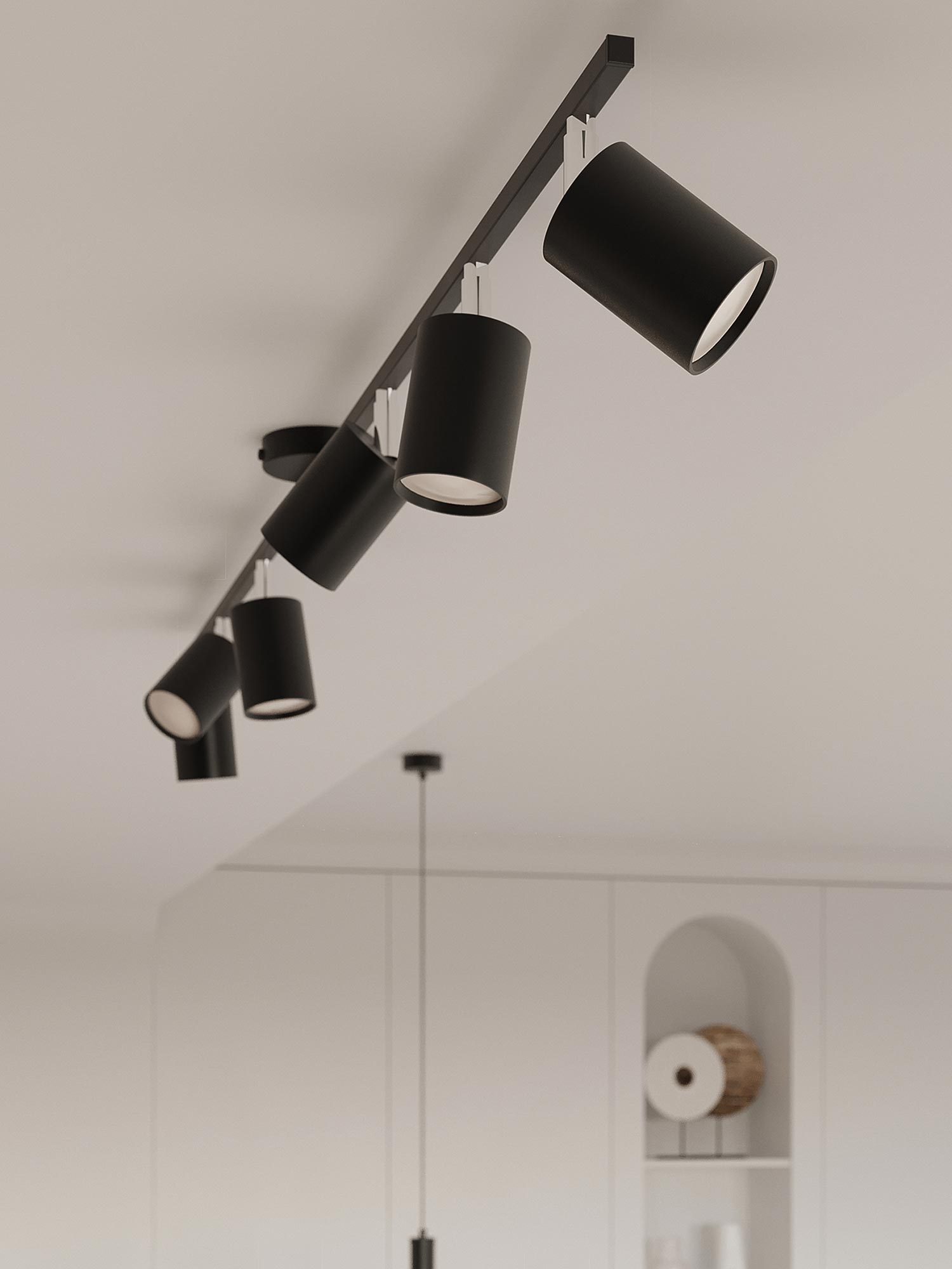 Detal czarnej szyny sufitowej z ruchomymi reflektorami Detal czarnej szyny sufitowej z ruchomymi reflektorami