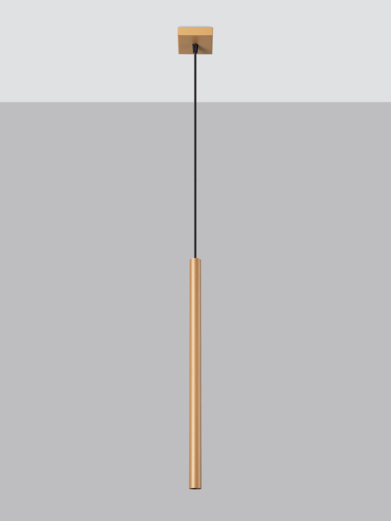 Pojedyncza tuba LED w złotym kolorze na jasnym tle Pojedyncza tuba LED w złotym kolorze na jasnym tle