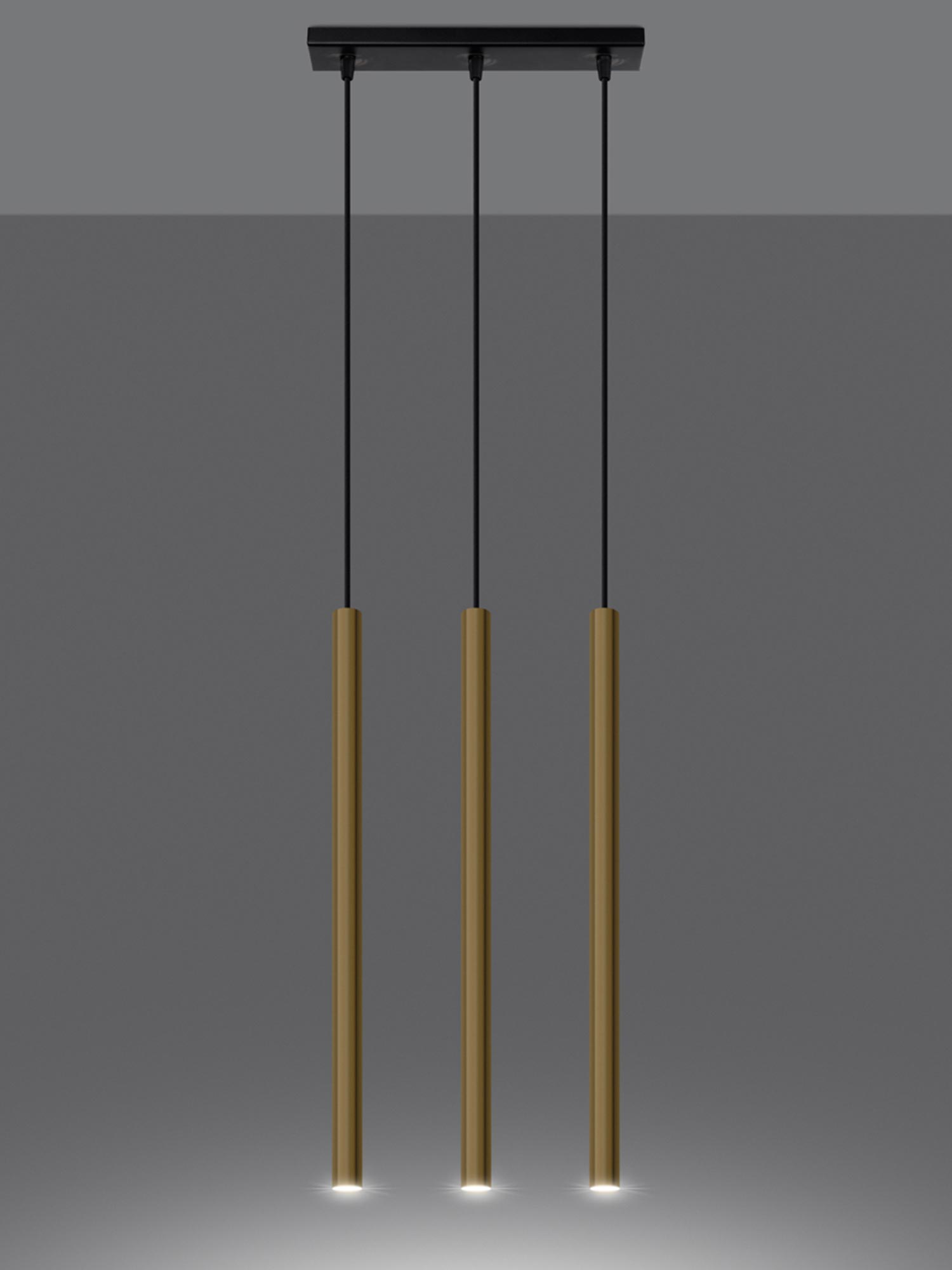 Złota lampa LED zawieszona na tle ciemnoszarej ściany Złota lampa LED zawieszona na tle ciemnoszarej ściany