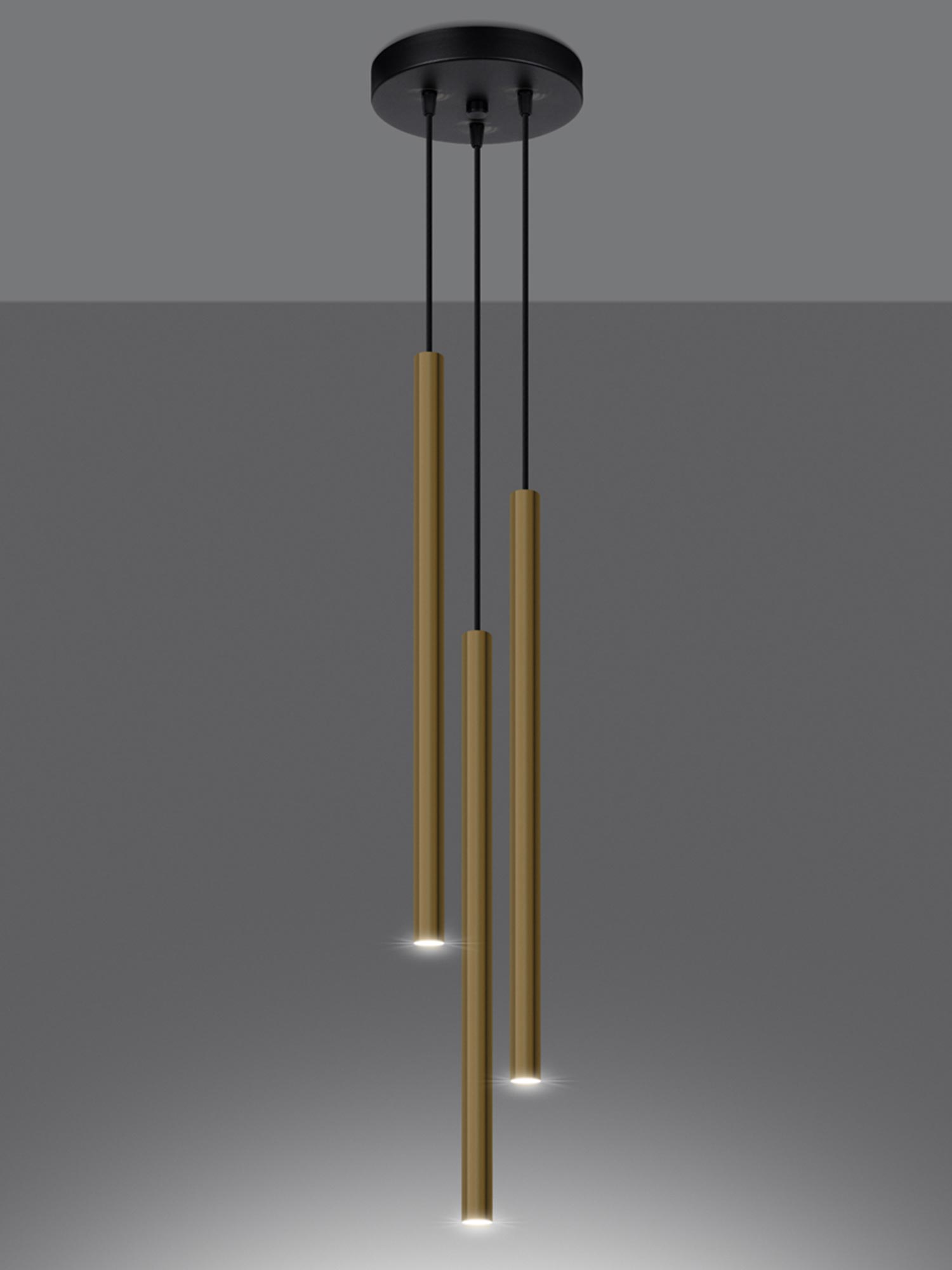 Dwie złote lampy tubowe LED w aranżacji wieczornej Dwie złote lampy tubowe LED w aranżacji wieczornej