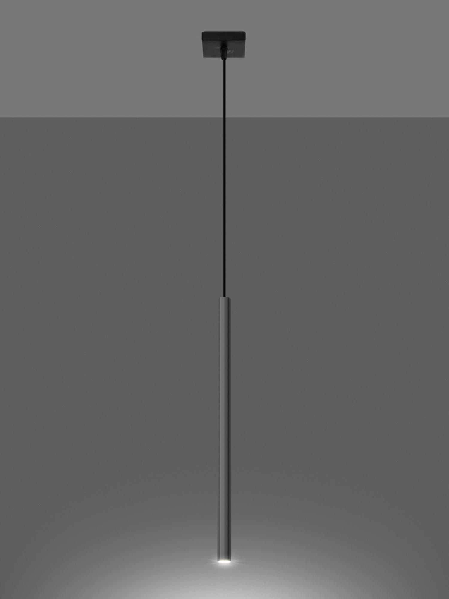 Nowoczesna lampa tubowa z dwoma przewodami w ciemnej aranżacji Nowoczesna lampa tubowa z dwoma przewodami w ciemnej aranżacji