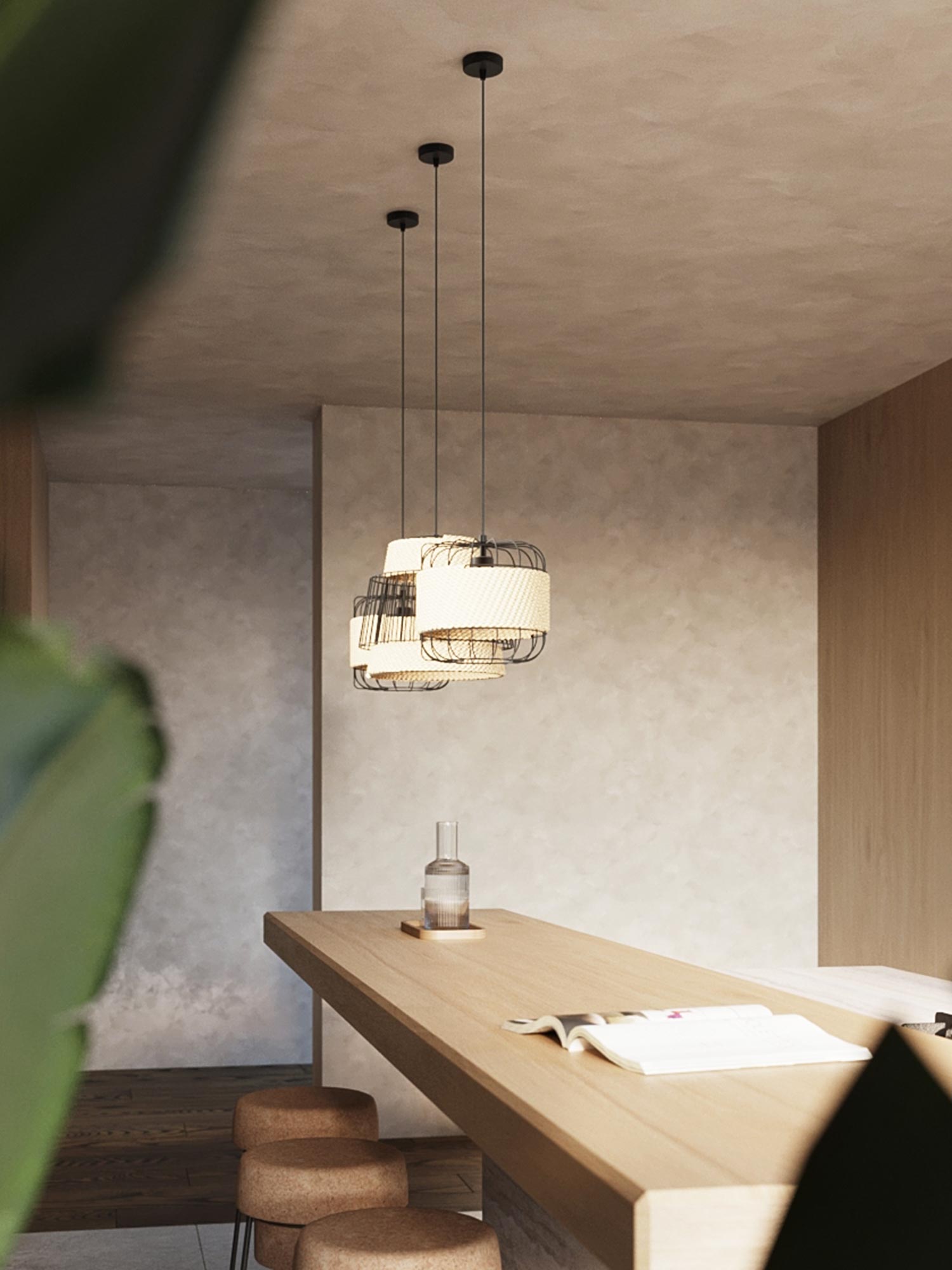 Dwie lampy wiszące z plecionymi kloszami nad wyspą kuchenną Dwie lampy wiszące z plecionymi kloszami nad wyspą kuchenną