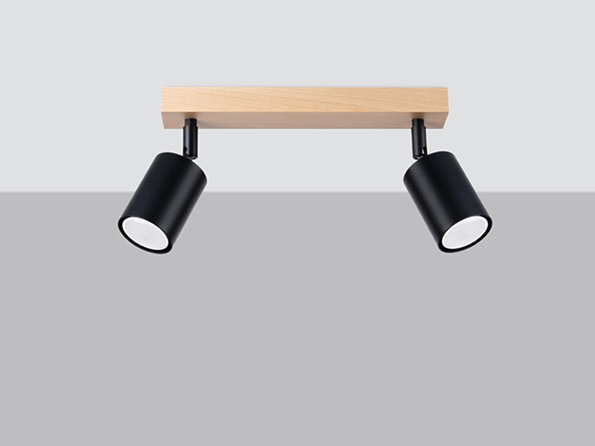 Drewniana listwa sufitowa z dwoma punktami światła na białym tle