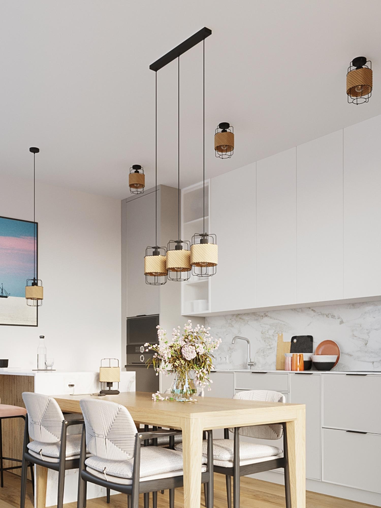 Trzy lampy wiszące z rattanu na jednej czarnej lince Trzy lampy wiszące z rattanu na jednej czarnej lince