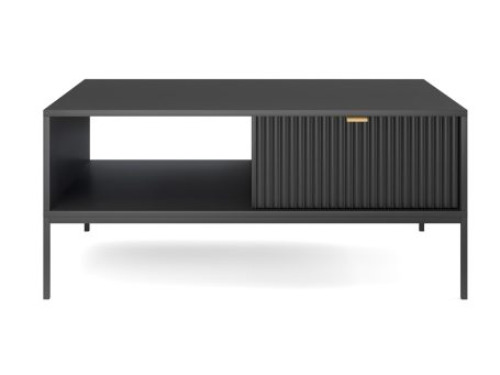 Czarna szafka RTV z ozdobnym frezowaniem i szufladą na metalowych nogach