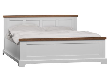 Nowoczesne łóżko sypialniane z elementem drewnianym