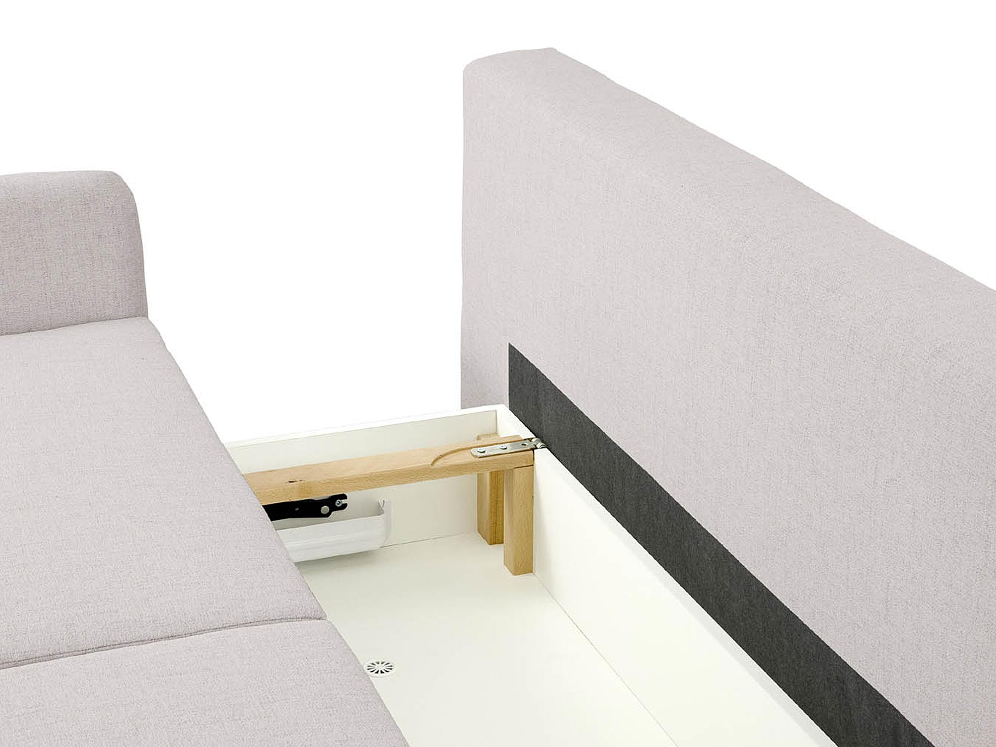 Detal jasnobeżowej sofy z prostymi liniami Detal jasnobeżowej sofy z prostymi liniami