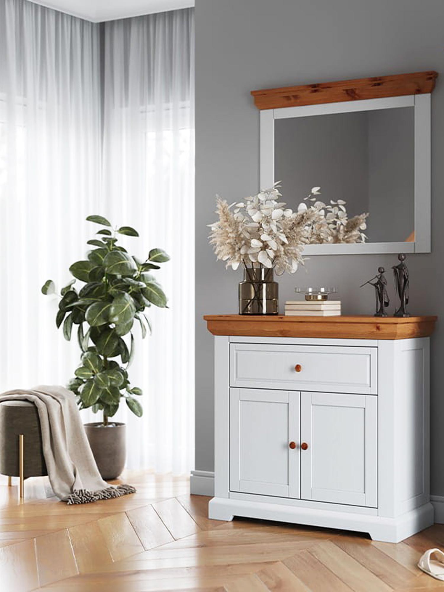 Biała szafka z drewnianym blatem i uchwytami