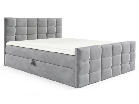 Łóżko tapicerowane w jasnoszarym kolorze z prostym, nowoczesnym designem