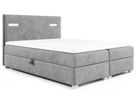 Łóżko tapicerowane w jasnoszarym kolorze z minimalistycznym zagłówkiem