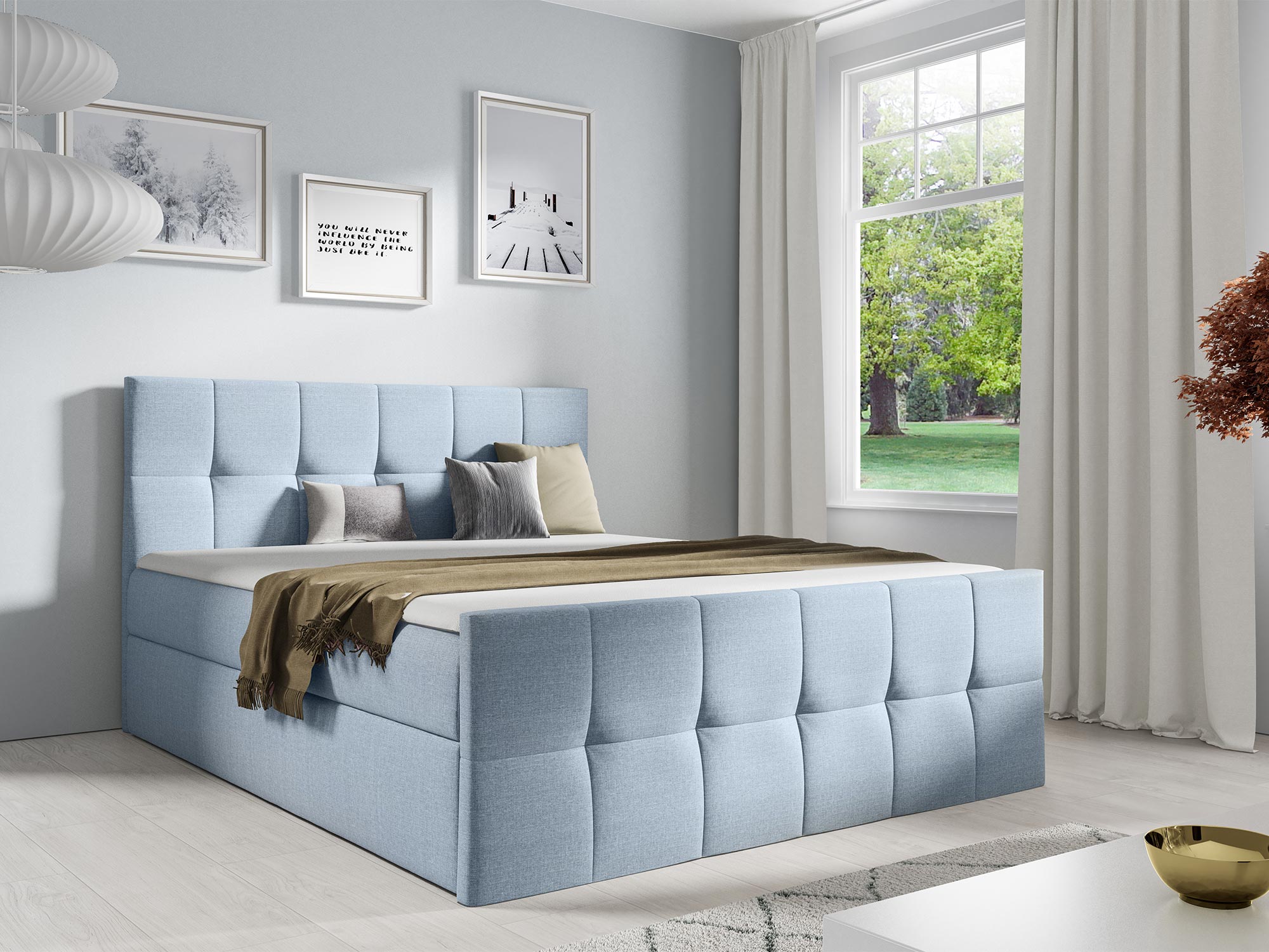 Łóżko tapicerowane w jasnoniebieskim kolorze z pikowanym zagłówkiem Łóżko tapicerowane w jasnoniebieskim kolorze z pikowanym zagłówkiem