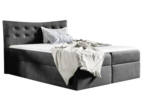 Łóżko tapicerowane w grafitowym kolorze z poduszkami