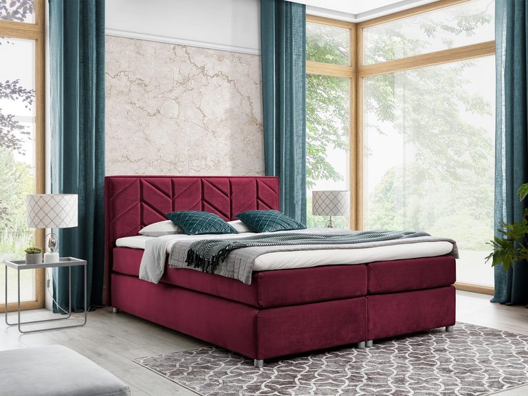 Bordowe łóżko tapicerowane w nowoczesnej sypialni
