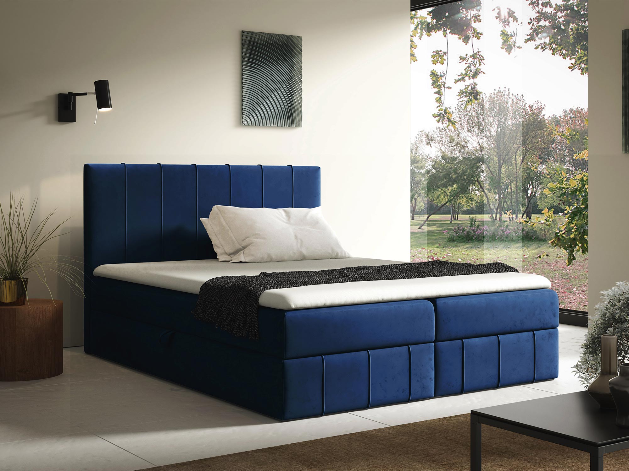 Łóżko tapicerowane w granatowym kolorze z pikowanym zagłówkiem Łóżko tapicerowane w granatowym kolorze z pikowanym zagłówkiem