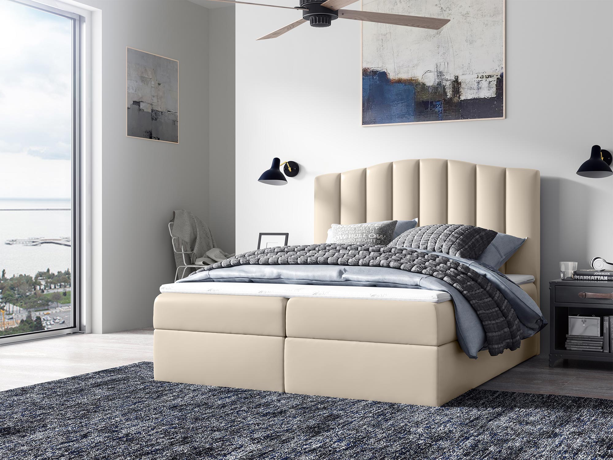 Łóżko tapicerowane w beżowym kolorze z wysokim, zaokrąglonym zagłówkiem Łóżko tapicerowane w beżowym kolorze z wysokim, zaokrąglonym zagłówkiem