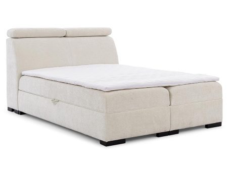 Łóżko tapicerowane w kolorze kremowym z regulowanym zagłówkiem – wygodne łóżko do sypialni z funkcją regulacji zagłówka.