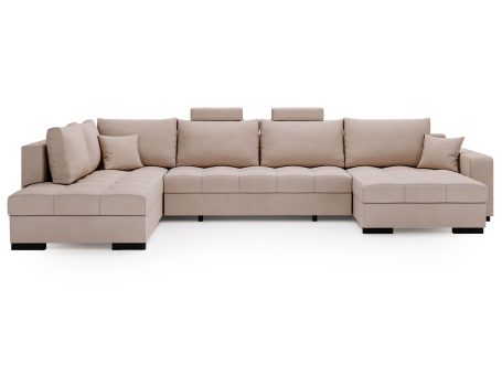 Beżowy narożnik w nowoczesnej sypialni z funkcją spania i pojemnikiem