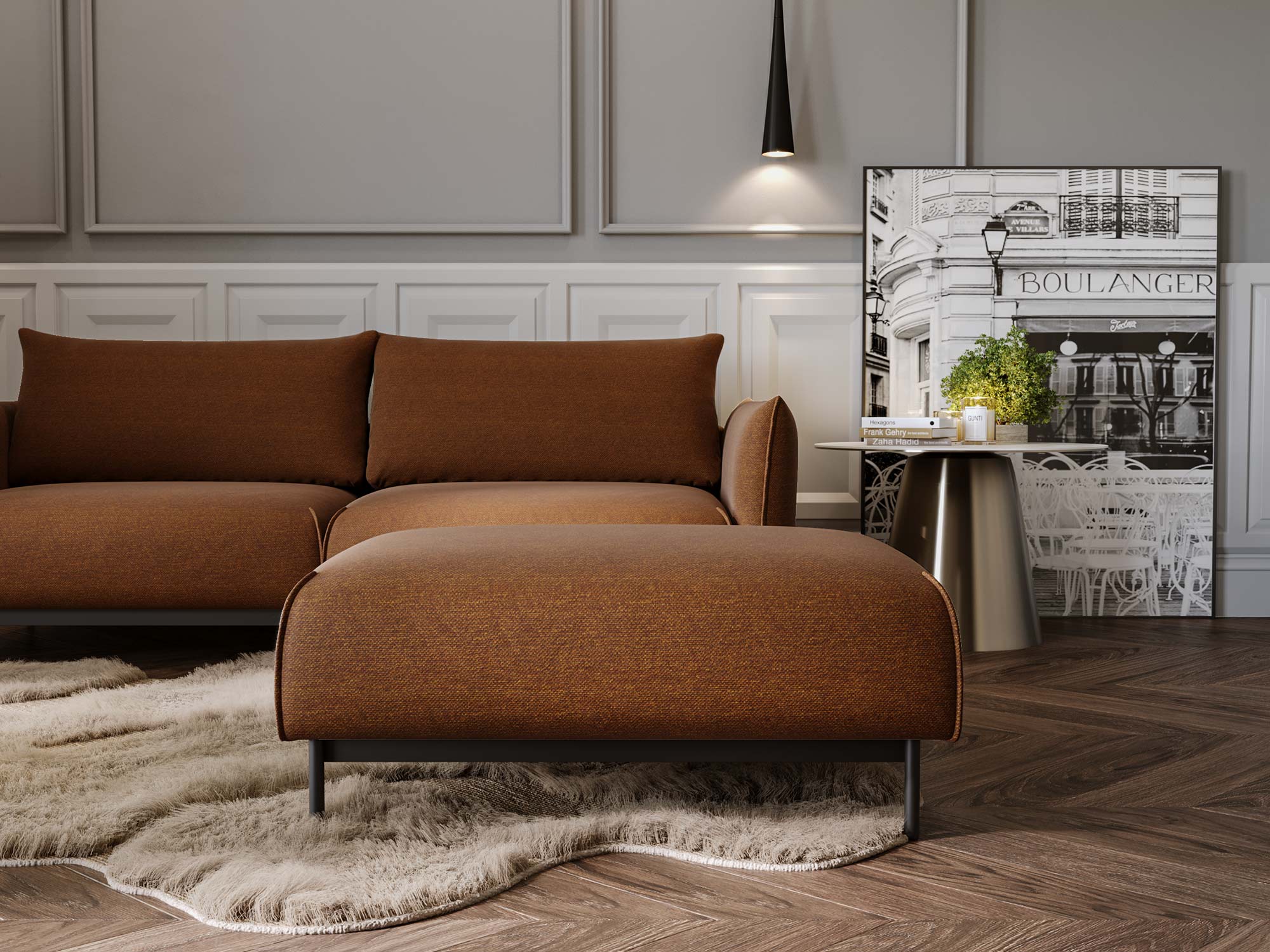 Pufa ceglastobrązowa w stylu industrialnym na dywanie w salonie Pufa ceglastobrązowa w stylu industrialnym na dywanie w salonie