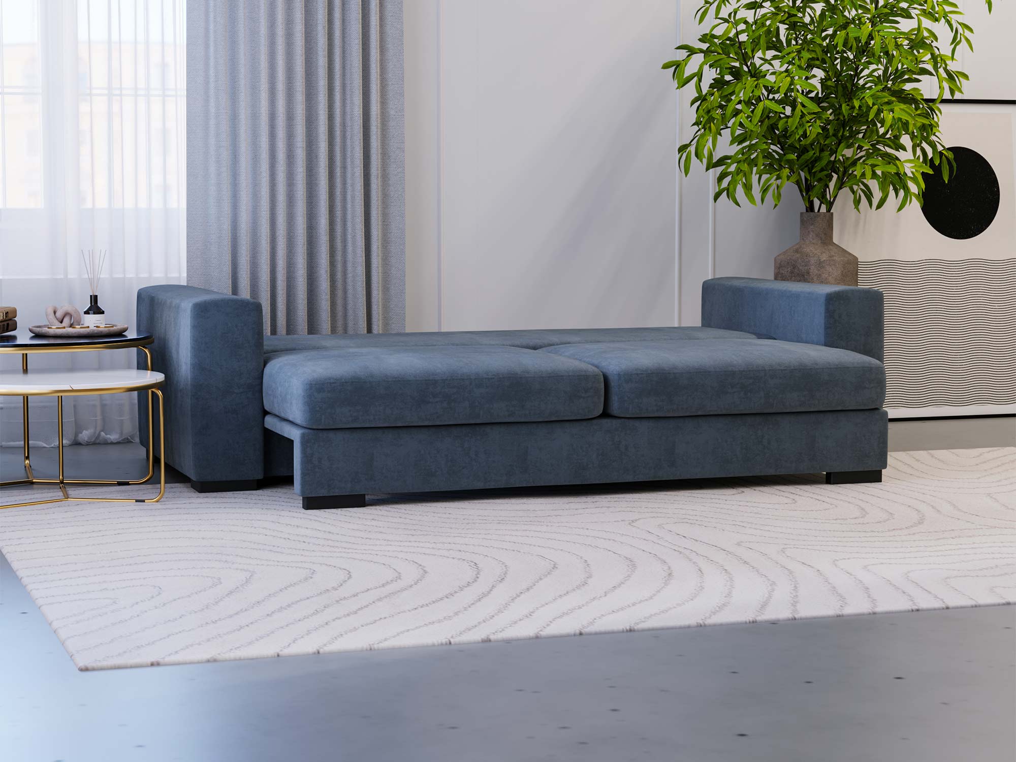 Sofa granatowa narożna z szerokim siedziskiem w salonie