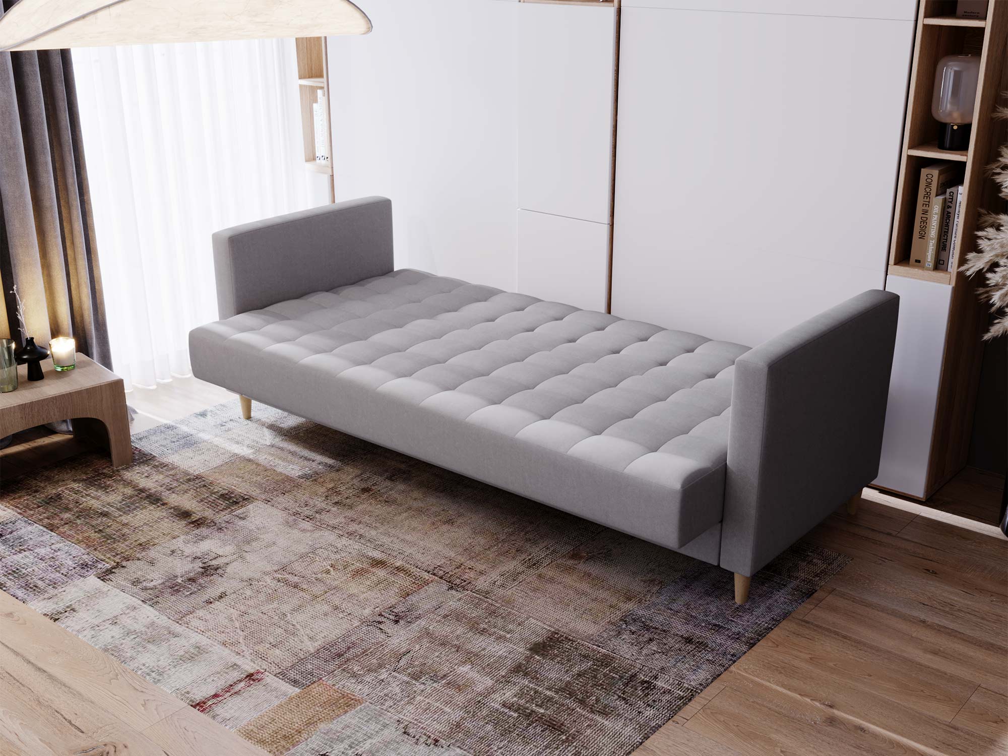 Nowoczesna sofa z funkcją spania i podłokietnikami w aranżacji salonu