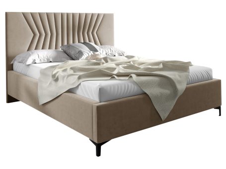 Łóżko tapicerowane w kolorze kremowym z dekoracyjnym zagłówkiem – luksusowe łóżko do sypialni, które nadaje wnętrzu elegancji.