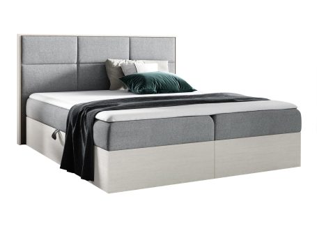 Szare łóżko z minimalistycznym zagłówkiem w stylu skandynawskim