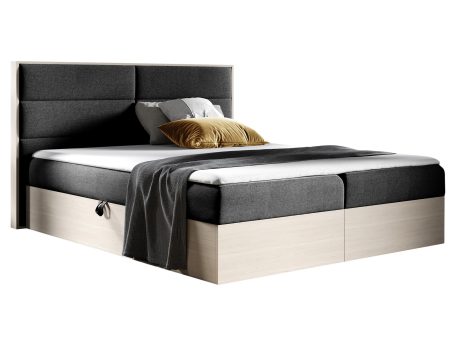 Czarne łóżko z nowoczesną ramą i miękką tkaniną w stylu loft