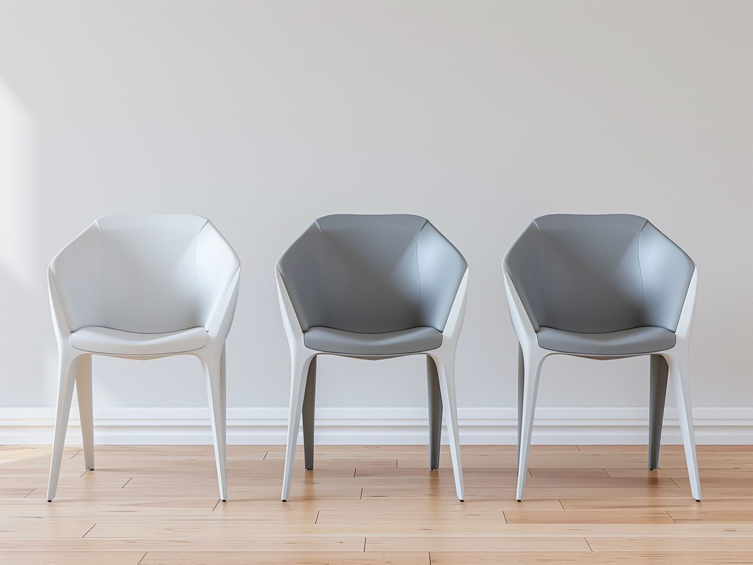 Nowoczesna strefa wypoczynku z szarymi krzesłami na jasnej podłodze