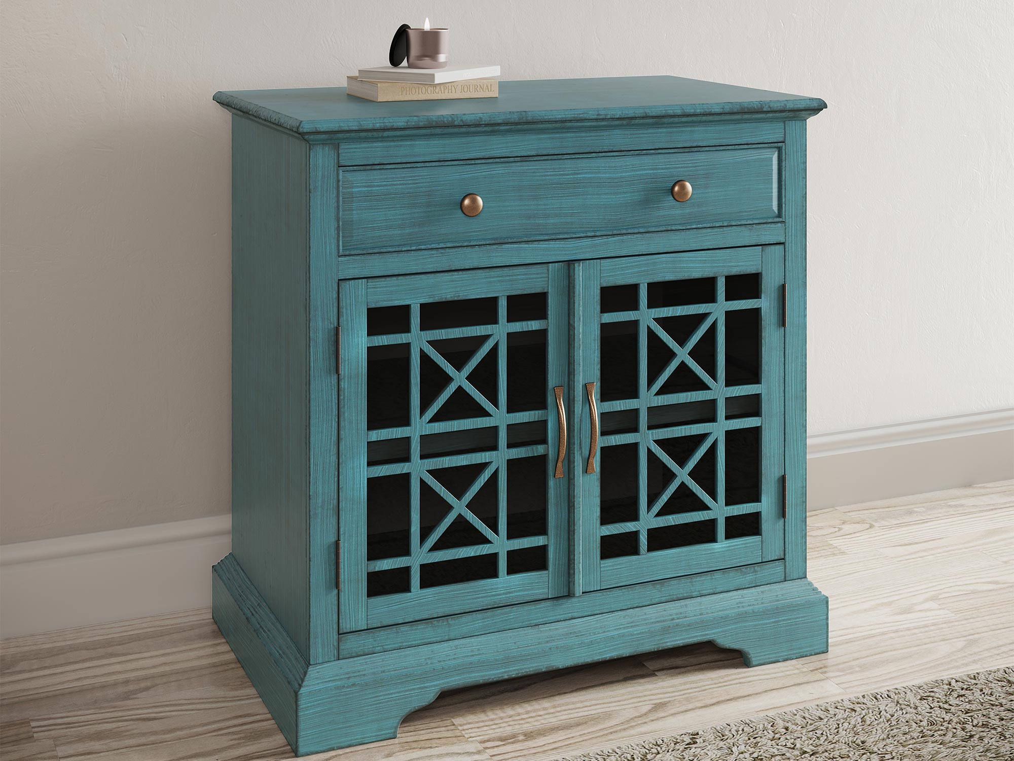Turkusowa drewniana komoda z dekoracyjnymi frontami i szufladami