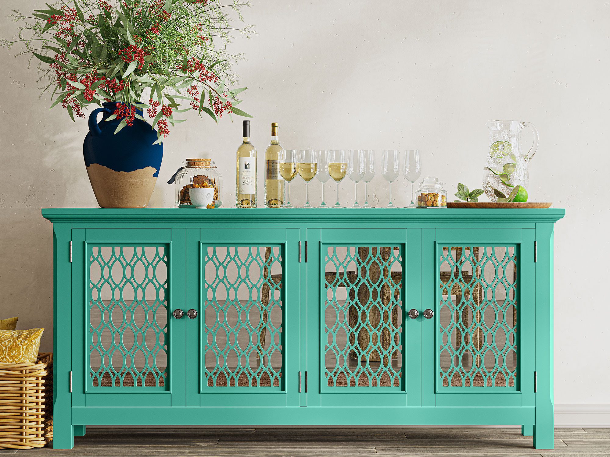 Komoda w stylu boho z ażurowymi drzwiami w zielonym kolorze