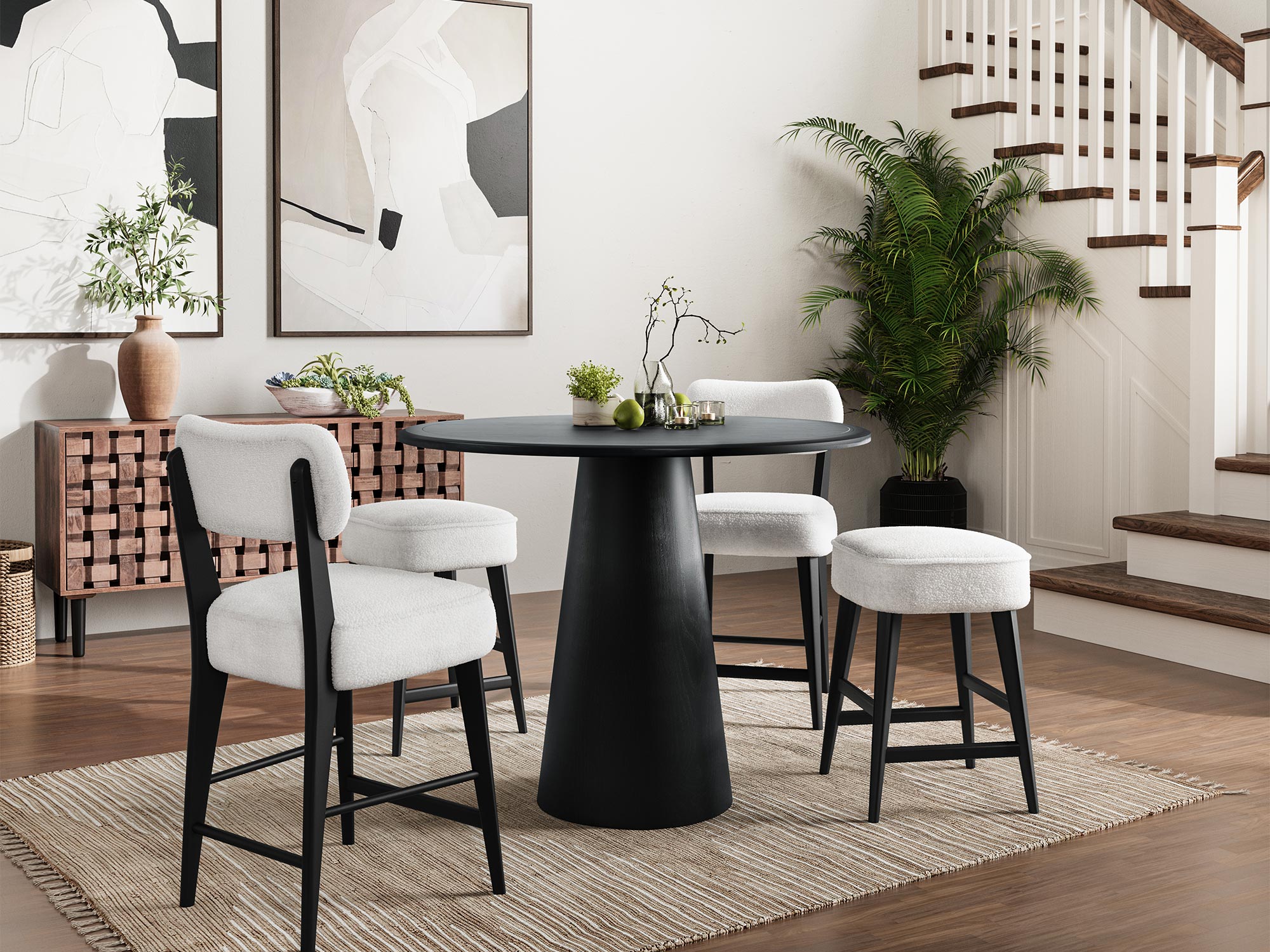 Nowoczesny okrągły stół z czarnym blatem do eleganckiego wnętrza