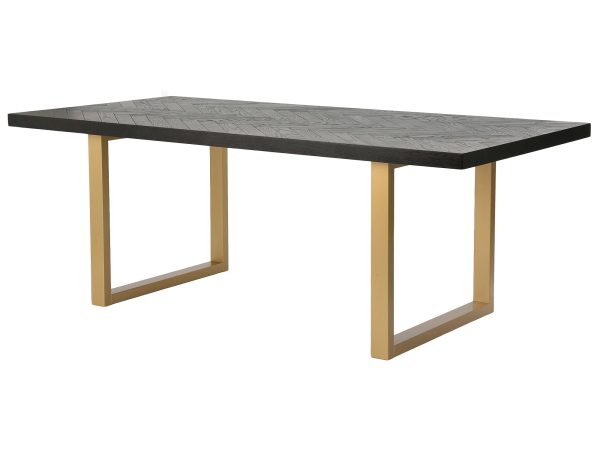 Minimalistický stůl do jídelny z ciemnego dřeva a zlatými nohami