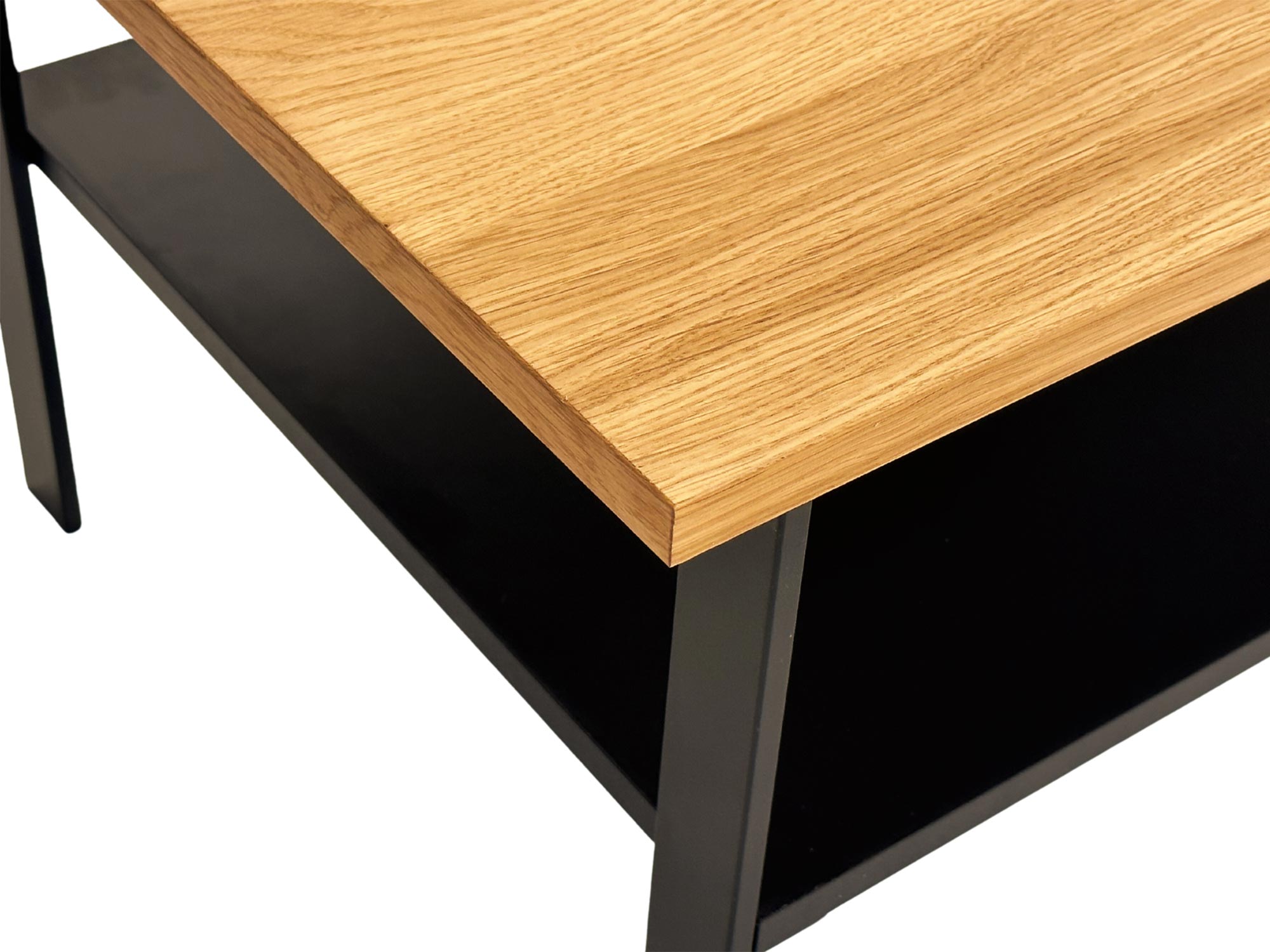 Detal blatu i czarnej konstrukcji stolika kawowego