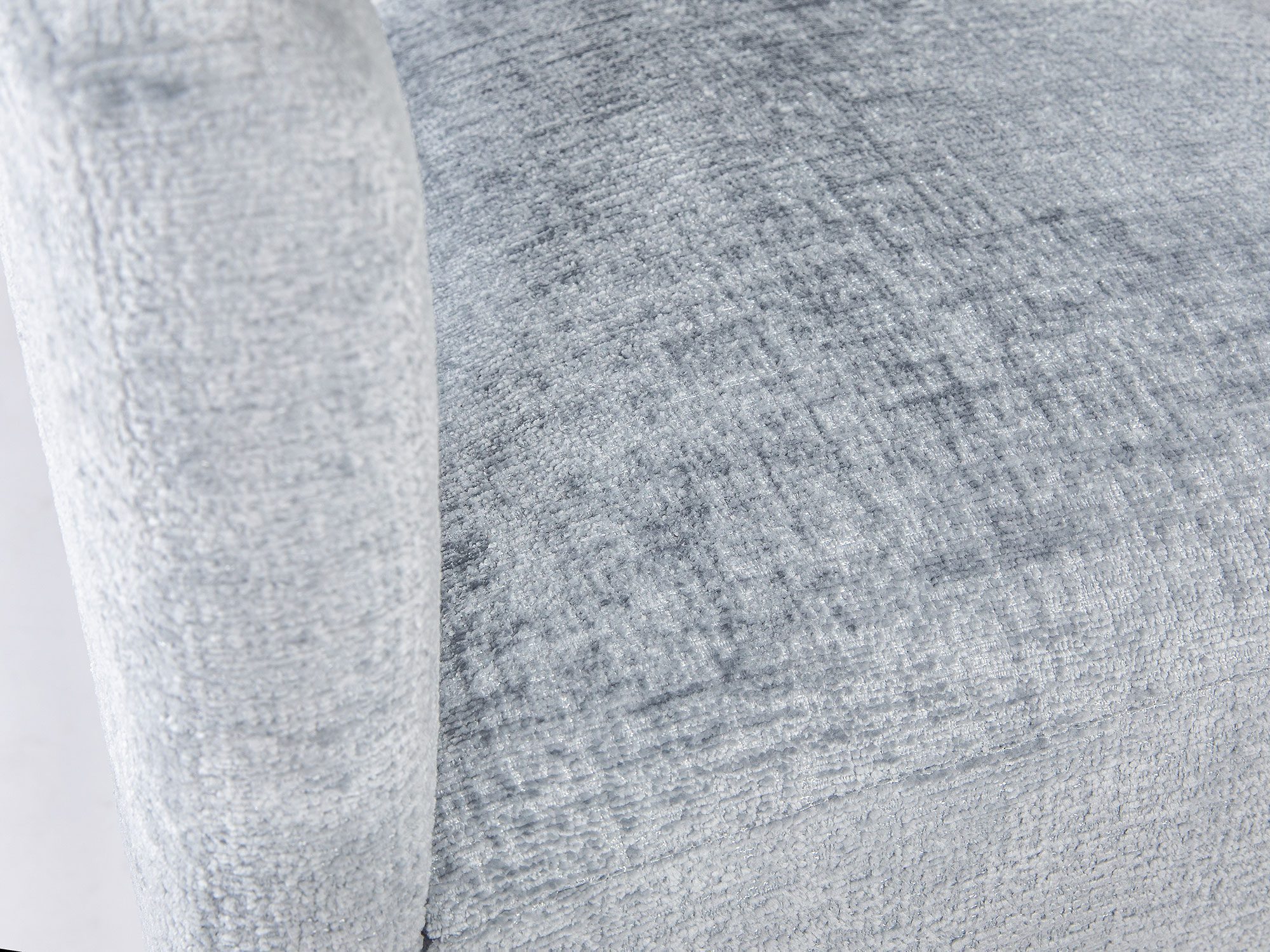 Zbliżenie na strukturę tkaniny boucle w kolorze stalowym