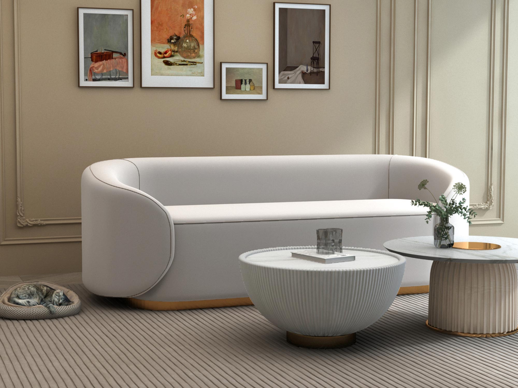 Aranżacja salonu z białą sofą i czarnym stolikiem z marmurowym blatem