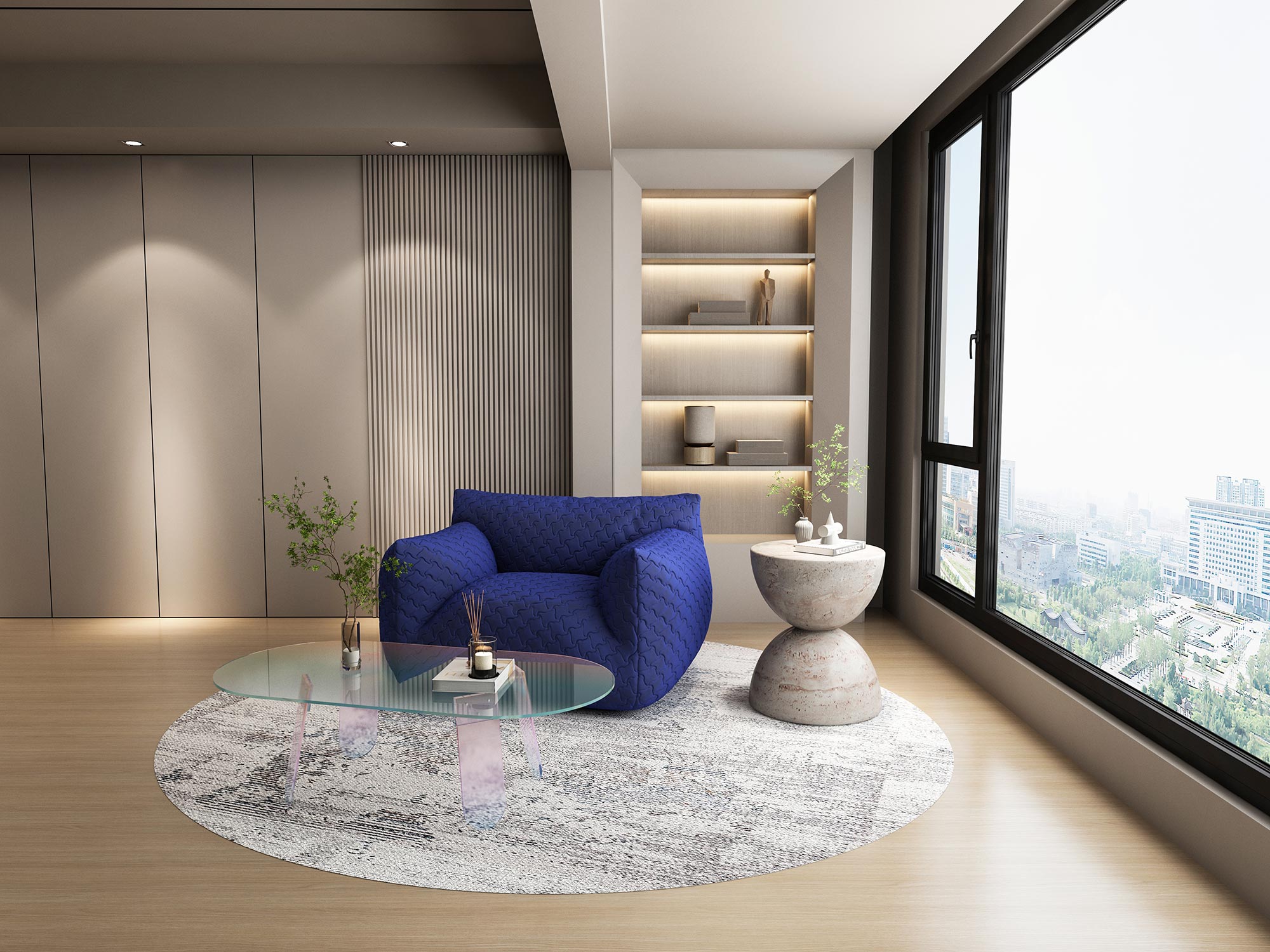 Salon z designerskimi stolikami ze szkła i fotel w kolorze niebieskim