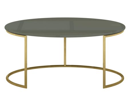 Stolik kawowy w stylu modern ze złotymi nogami