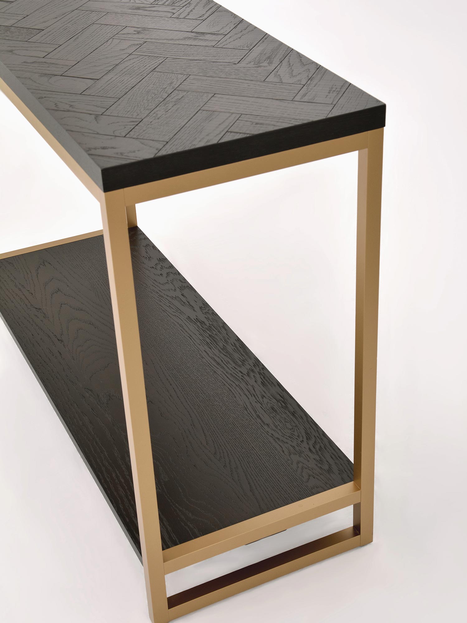 Konsola glamour z czarnym połyskiem i złotymi nogami